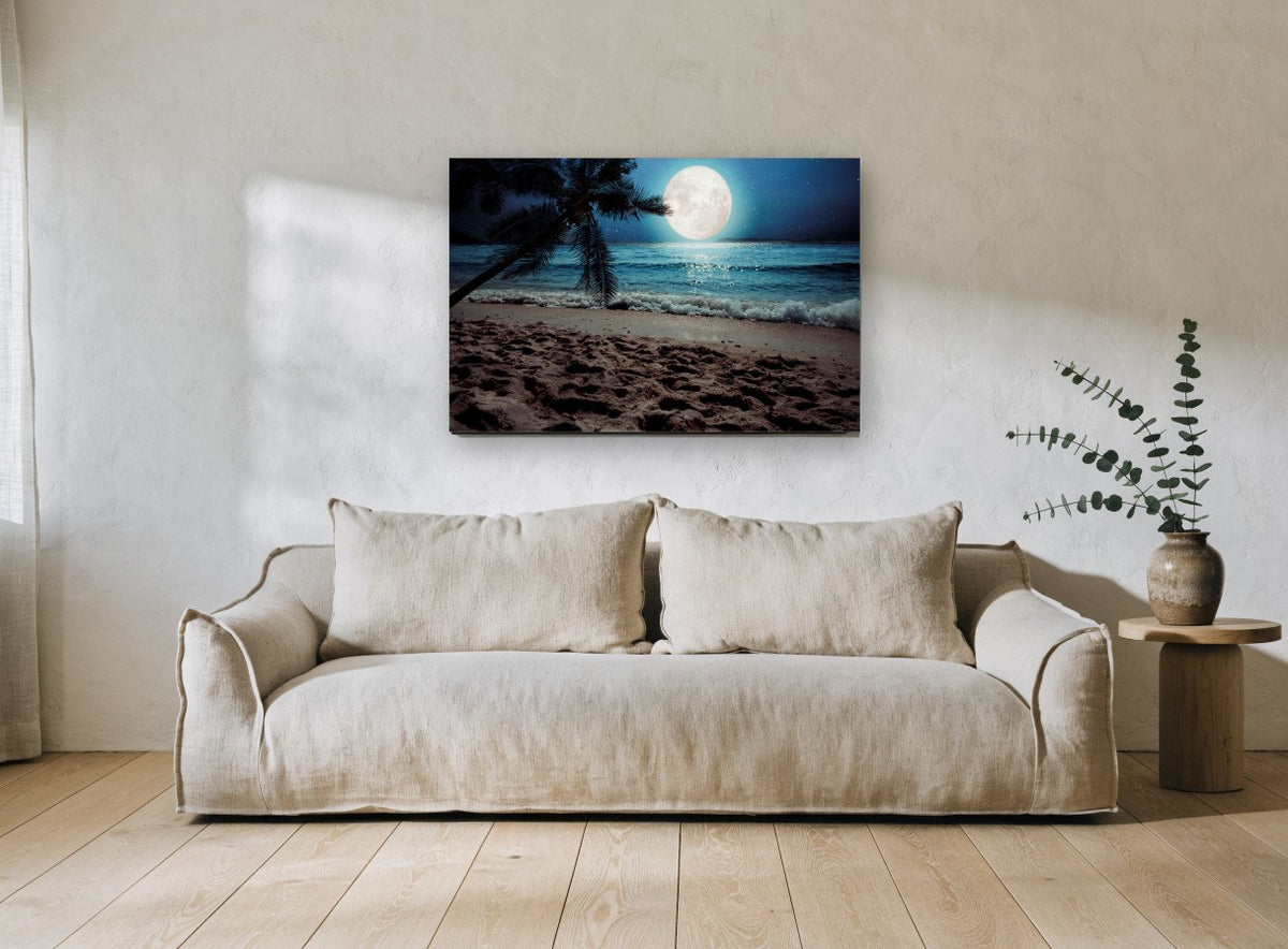 Moonlit Palm Shore coastal canvas print on the wall of a living room