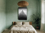 Lone Figure Jetty coastal canvas print on the wall of a bedroom
