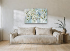 Bluebirds in Blossom floral canvas print on the wall of a living room