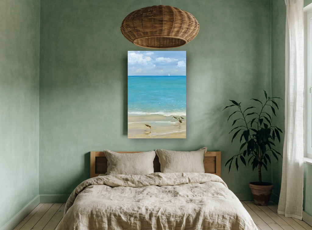 Sandpipers at the Shoreline coastal canvas print on the wall of a bedroom