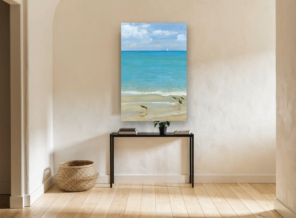 Sandpipers at the Shoreline coastal canvas print on the wall of a hallway