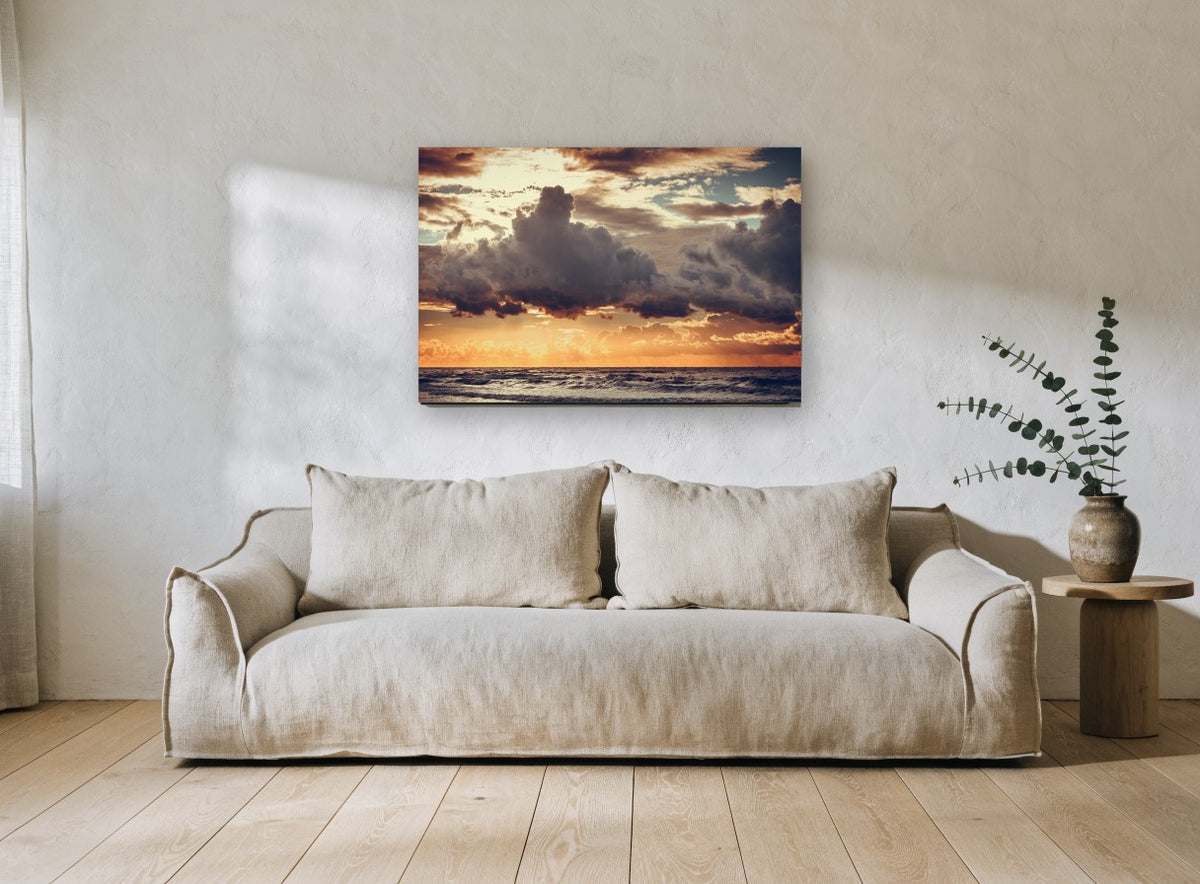 Storm Clouds at Dusk coastal canvas print on the wall of a living room