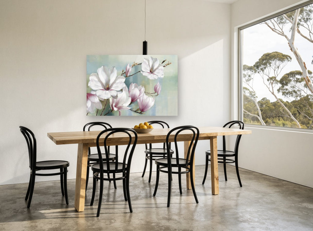 Magnolia Branch in Soft Haze floral canvas print on the wall of a dining room