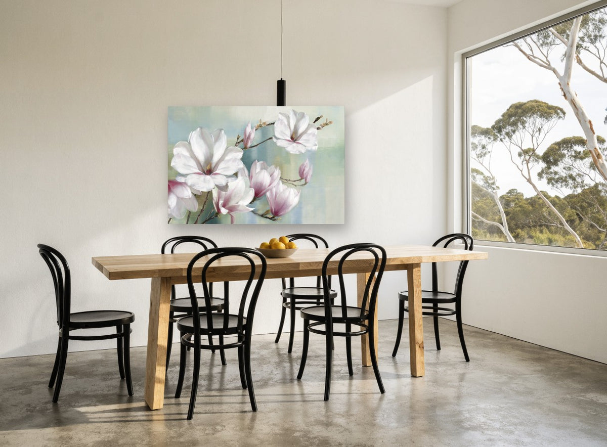 Magnolia Branch in Soft Haze floral canvas print on the wall of a dining room