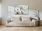 Magnolia Branch in Soft Haze floral canvas print on the wall of a living room