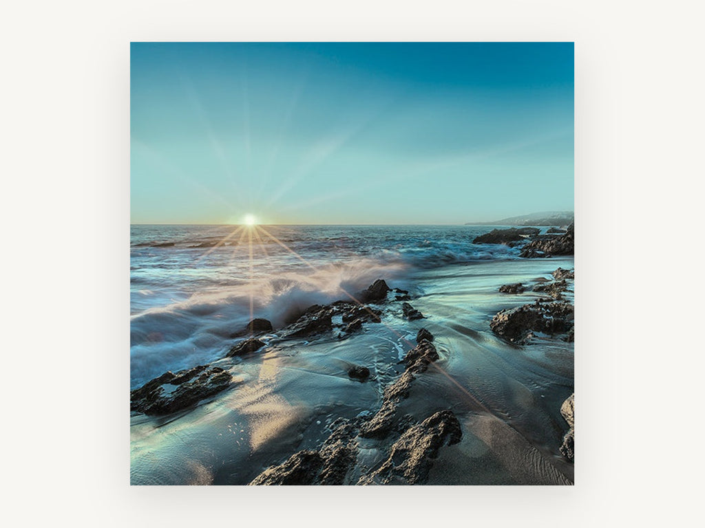 Starburst Over Rocky Shore, coastal canvas wall art print, front view