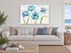 Blue Tulips on Shiplap floral canvas print on the wall of a beach house living room
