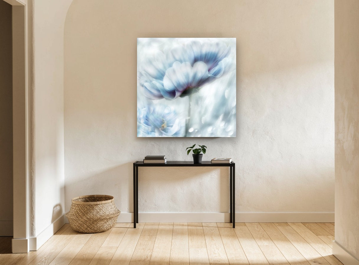 Pale Blue Bloom Haze floral canvas print on the wall of a hallway
