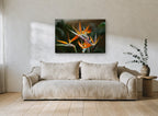 Orange Crane Blooms floral canvas print on the wall of a living room