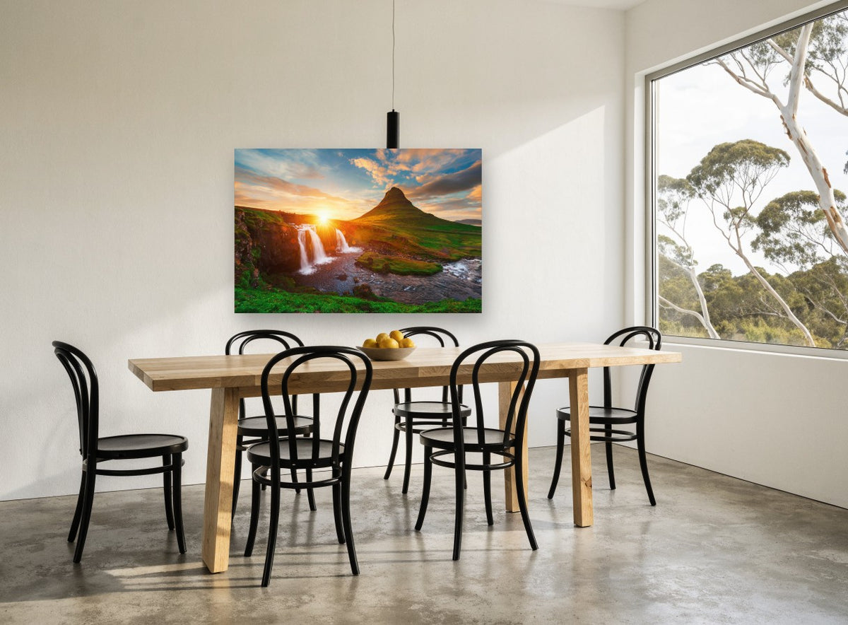 Sunburst Over Waterfall landscape canvas print on the wall of a dining room