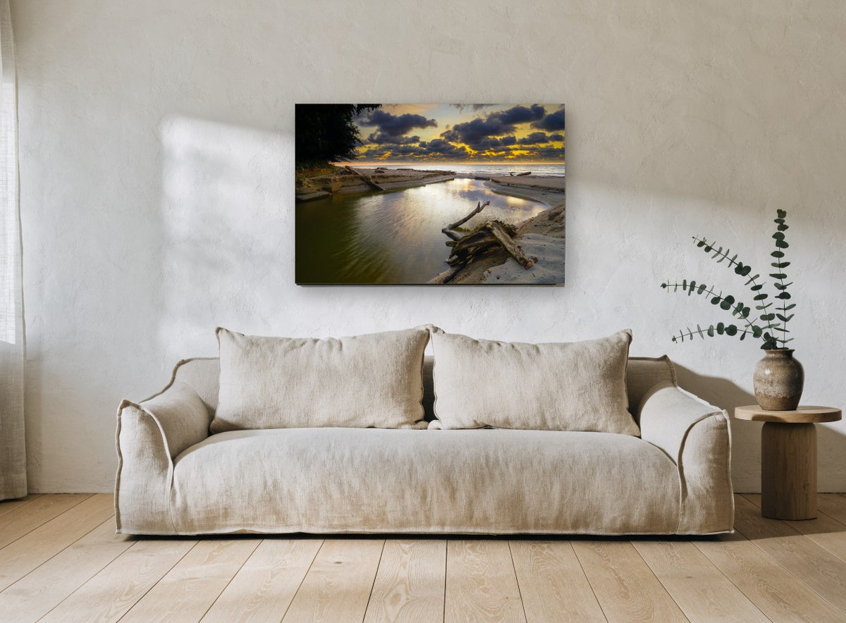 Driftwood Creek Dusk coastal canvas print on the wall of a living room