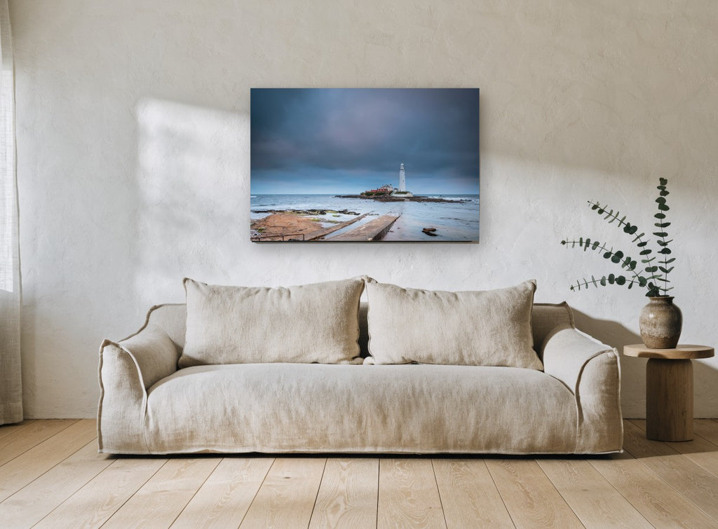Causeway to the Lighthouse coastal canvas print on the wall of a living room