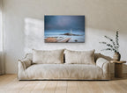 Causeway to the Lighthouse coastal canvas print on the wall of a living room