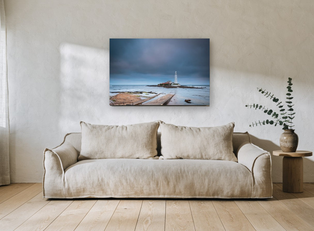 Causeway to the Lighthouse coastal canvas print on the wall of a living room