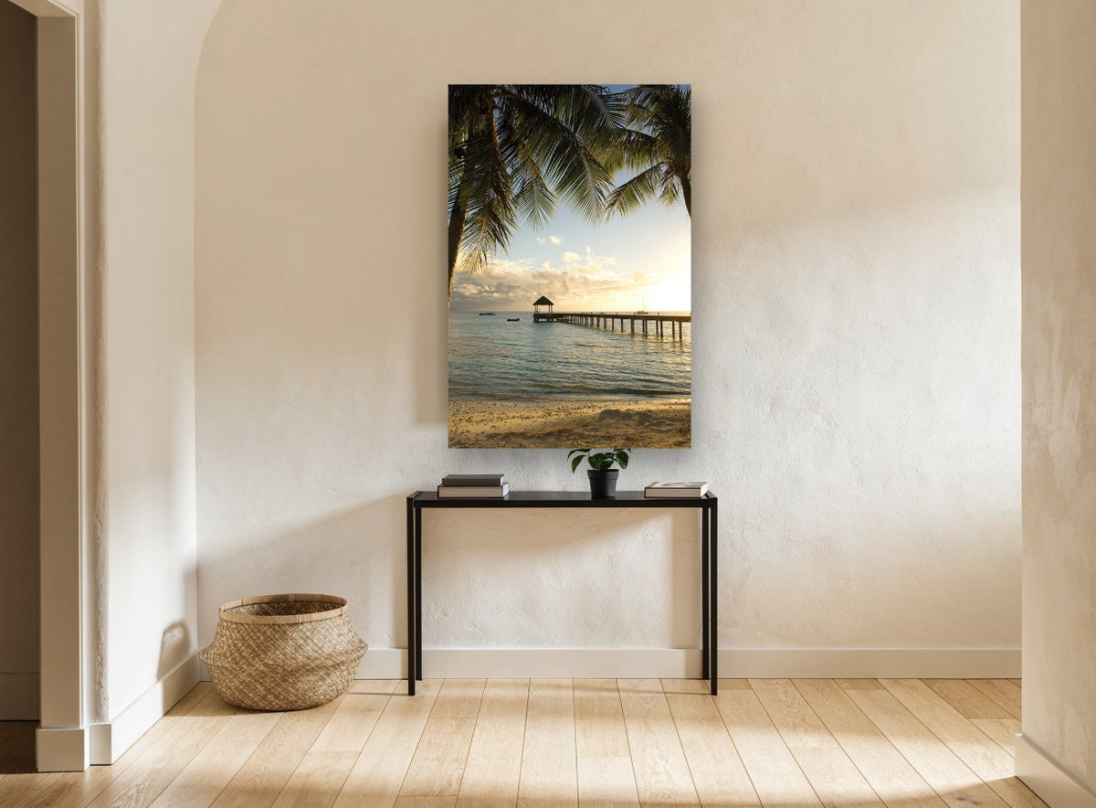 Palm Pier Sunset coastal canvas print on the wall of a hallway