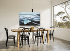 Glacial Shard Shoreline coastal canvas print on the wall of a dining room