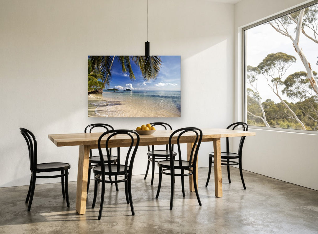 Palm Shade Shallows coastal canvas print on the wall of a dining room
