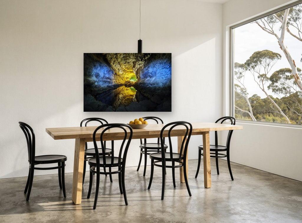Glowing Cavern Mirror landscape canvas print on the wall of a dining room