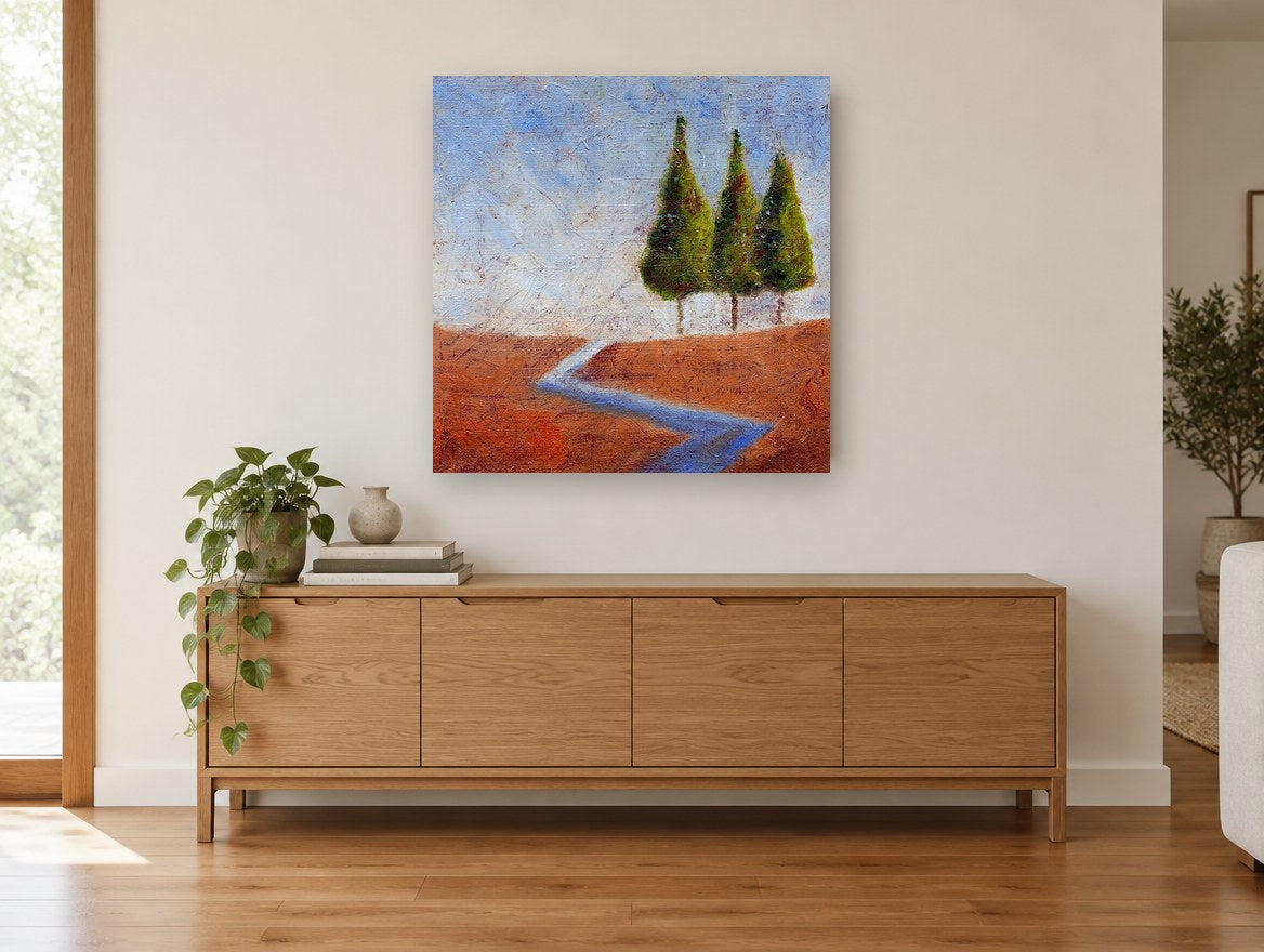Three Trees Blue Creek landscape canvas print on the wall of a living room above a sideboard
