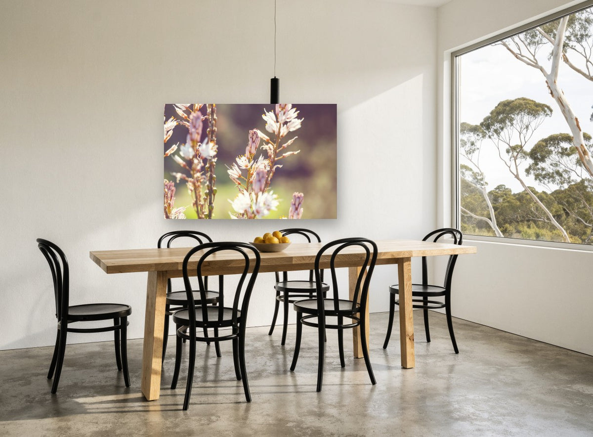Backlit Asphodel Spires floral canvas print on the wall of a dining room