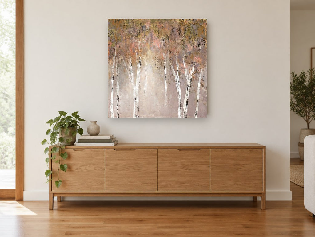 Blush Birch Glow landscape canvas print on the wall of a living room above a sideboard