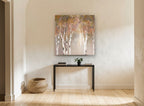 Mauve Mist Birches landscape canvas print on the wall of a hallway