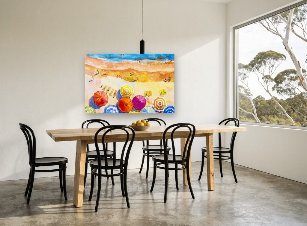 Sunlit Umbrella Shore coastal canvas print on the wall of a dining room
