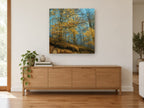 Golden Beech Blue Mist landscape canvas print on the wall of a living room above a sideboard