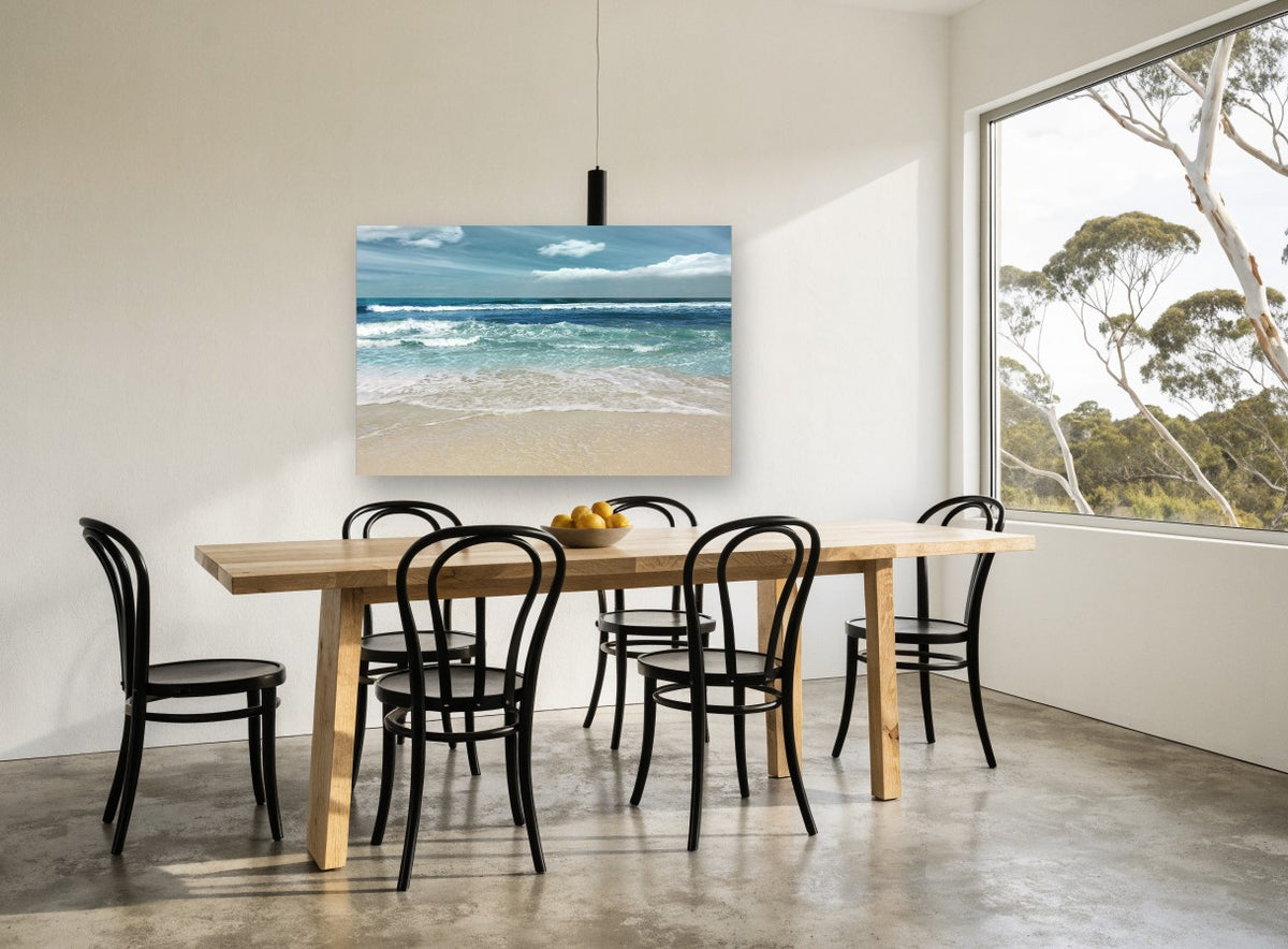 Teal Shore Break coastal canvas print on the wall of a dining room
