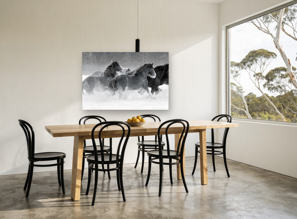 Galloping Through Snow landscape canvas print on the wall of a dining room
