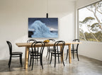 Storm Surge Beacon coastal canvas print on the wall of a dining room