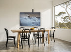 Storm Surge Lighthouse coastal canvas print on the wall of a dining room