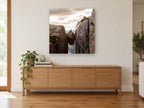 Boulder in the Gap landscape canvas print on the wall of a living room above a sideboard