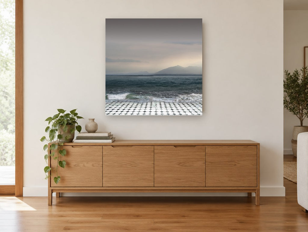 Tiled Shore Storm coastal canvas print on the wall of a living room above a sideboard