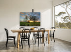 Three Oaks at Dusk landscape canvas print on the wall of a dining room