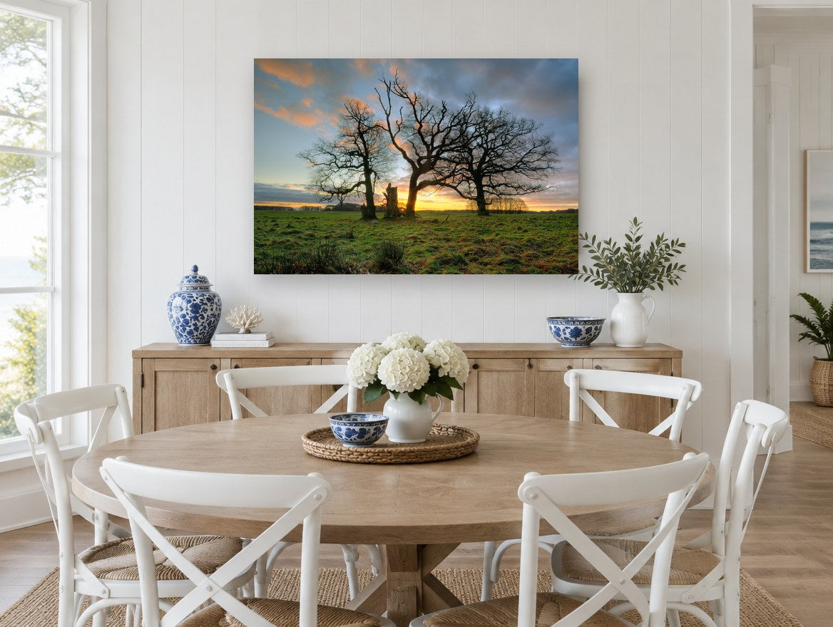 Three Oaks at Dusk landscape canvas print on the wall of a Hamptons dining room