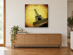 Aged Iron Ascent city canvas print on the wall of a living room above a sideboard