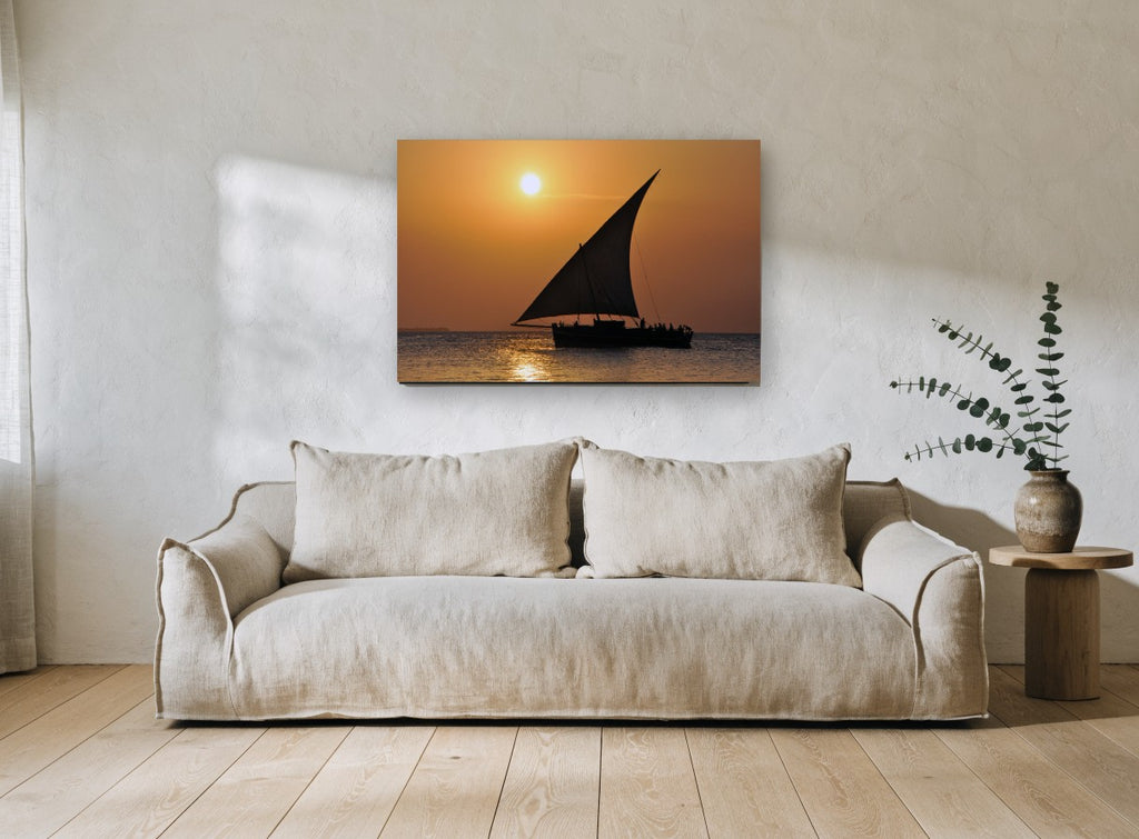 Dhow at Amber Dusk coastal canvas print on the wall of a living room