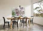 Fractal Flower Orbit floral canvas print on the wall of a dining room
