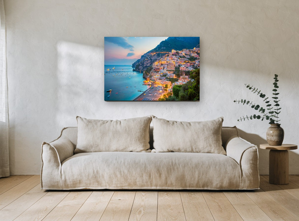 Positano Dusk Hillside coastal canvas print on the wall of a living room