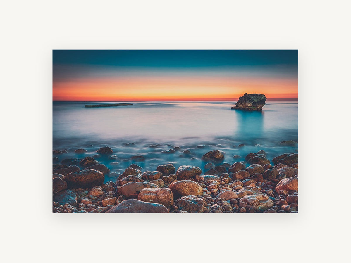 Pebble Shore Afterglow, coastal canvas wall art print, front view