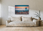 Pebble Shore Afterglow coastal canvas print on the wall of a living room