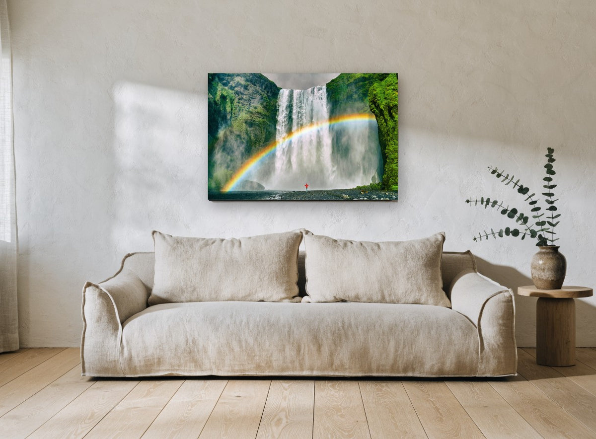 Rainbow Beneath the Falls landscape canvas print on the wall of a living room