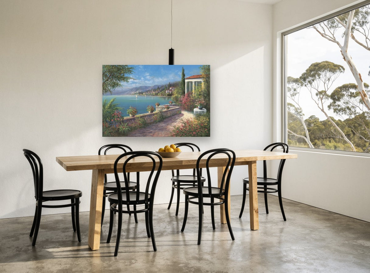 Sunlit Terrace Bay Blooms coastal canvas print on the wall of a dining room