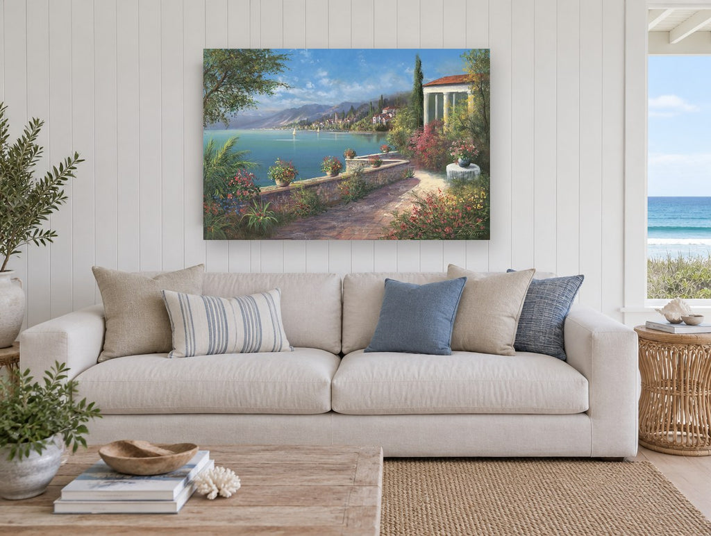Sunlit Terrace Bay Blooms coastal canvas print on the wall of a beach house living room