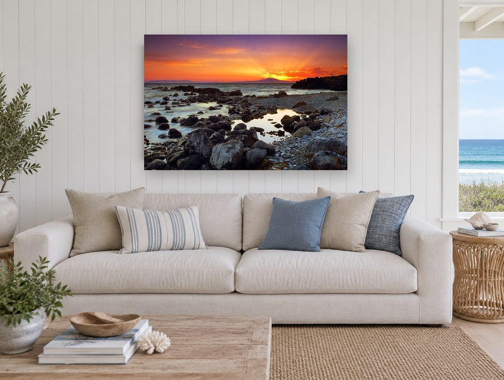 Mani Sunset Shore coastal canvas print on the wall of a beach house living room