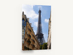 Eiffel Above the Rooftops, eiffel tower between paris buildings photograph, city canvas wall art print ready to hang