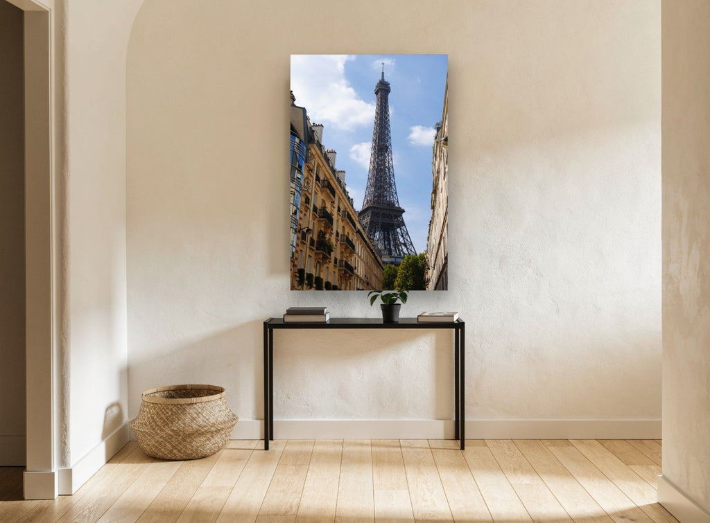 Eiffel Above the Rooftops city canvas print on the wall of a hallway