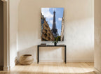 Eiffel Above the Rooftops city canvas print on the wall of a hallway