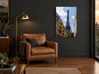 Eiffel Above the Rooftops city canvas print on the wall of a charcoal living room